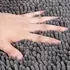 389130